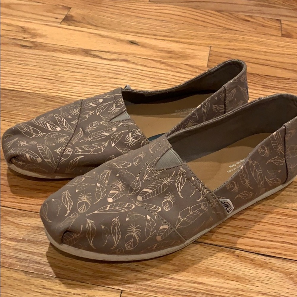 Toms. With rose gold feathers.